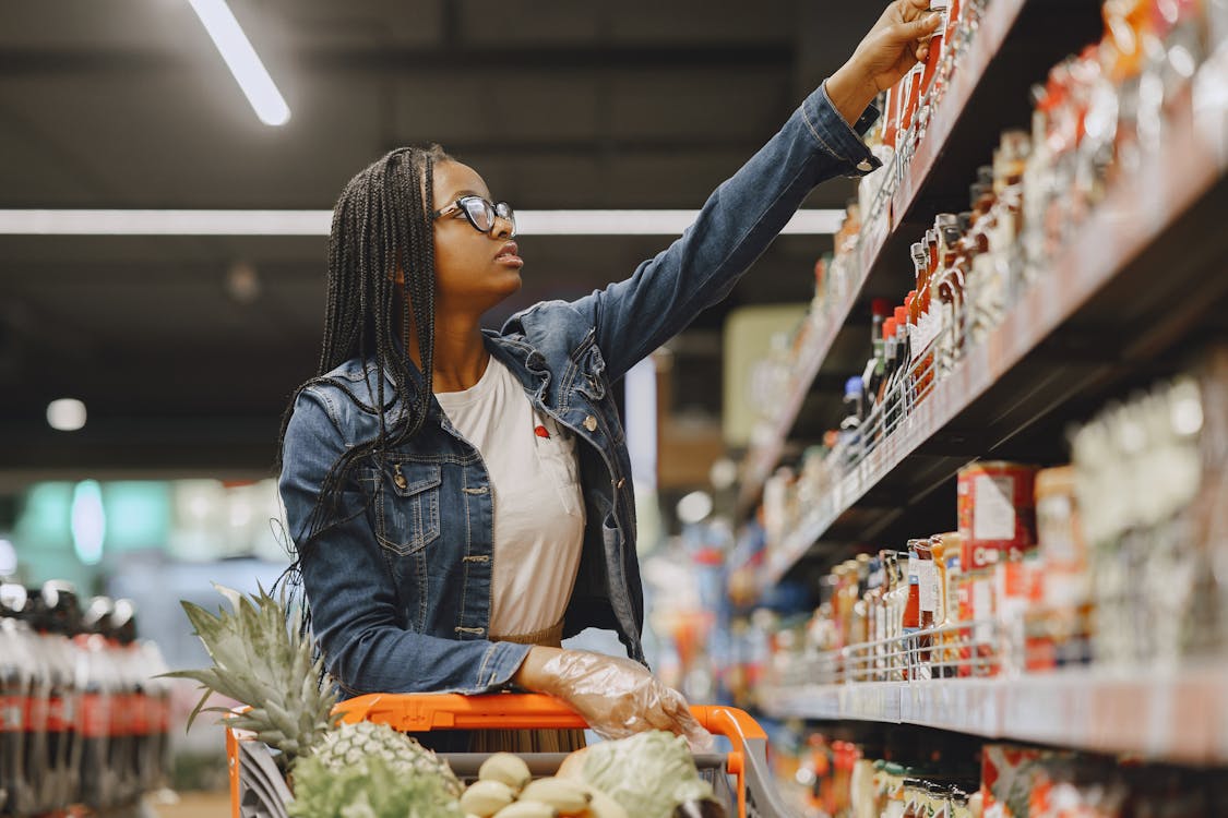 Supermarket aisle representing retail market dynamics